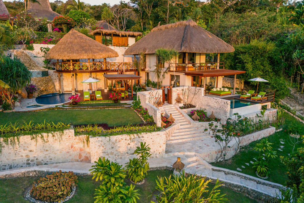 Putri Wamoro Jungle villa offers absolute peace, dramatic views, and a private outdoor deck with a plunge swimming pool surrounded by lush jungle.